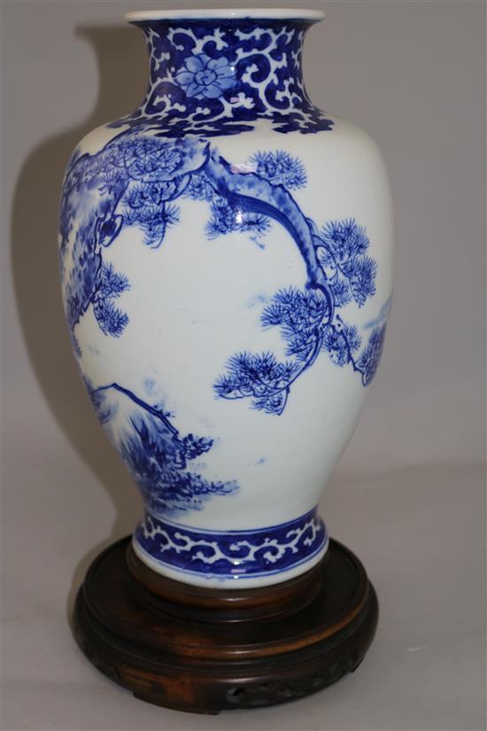 A Chinese porcelain blue and white baluster vase, 13.25in.